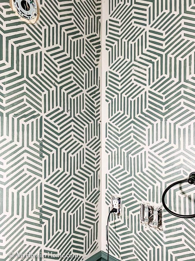 Looking for a budget-friendly way to update your bathroom walls? Here are all my tips for creating a bathroom wall stencil that makes a huge statement.