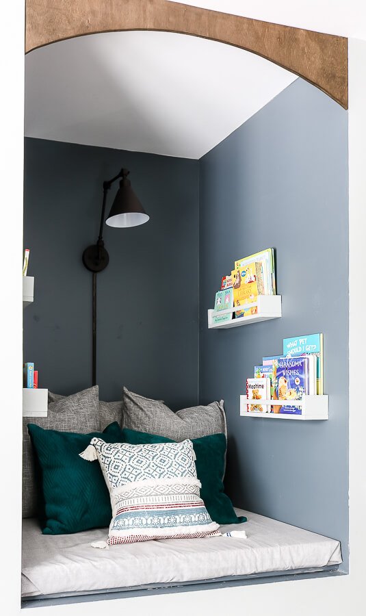 DIY reading nook with pillows and books