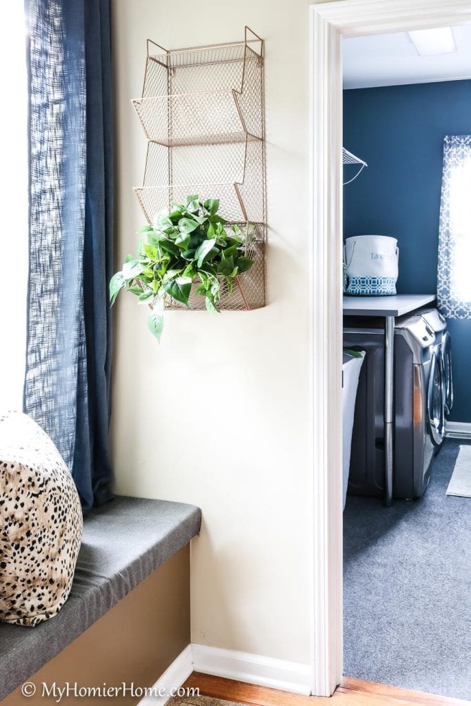 Learn how I transformed my tiny entryway window seat into a beautiful and functional space.