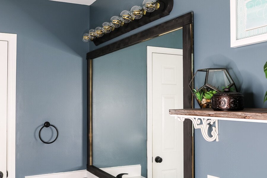 Bathroom need an upgrade? If you have $100 and some DIY zest, you can makeover your bathroom on a budget!