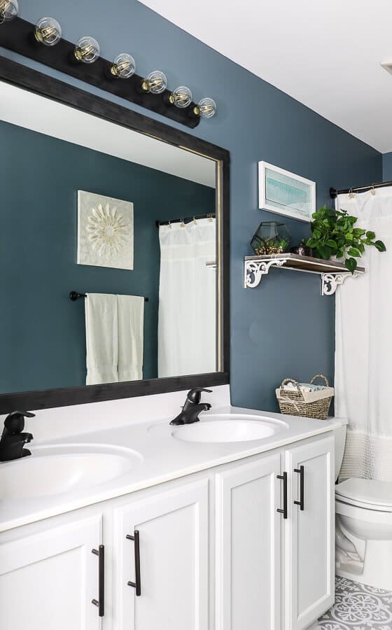 Bathroom need an upgrade? If you have $100 and some DIY zest, you can makeover your bathroom on a budget!