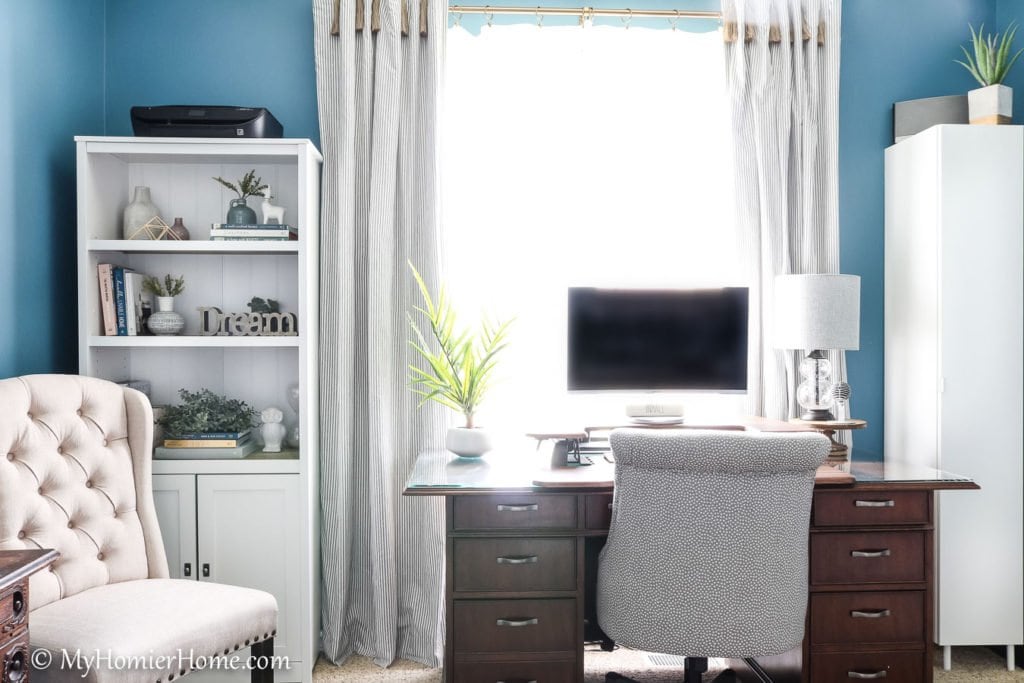 Looking for inspiration for your home office/craft room? My Home Office/Craft Room is complete! Come check out what I did in my final reveal, including a new light fixture, a statement ceiling, and all kinds of organization!