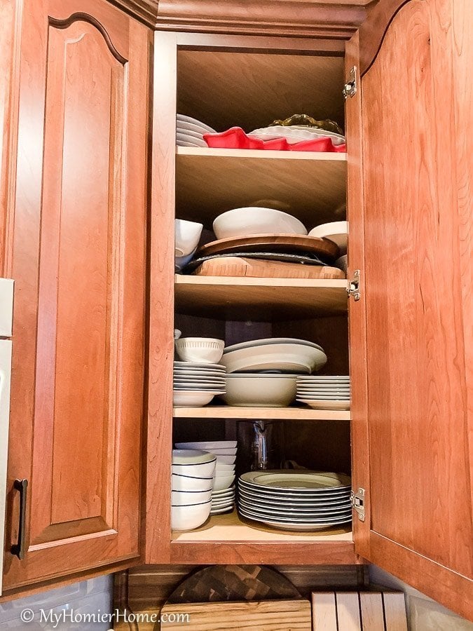 How to organize your kitchen cabinets using clear and simple strategies to tackle kitchen cabinet dysfunction without losing your mind.