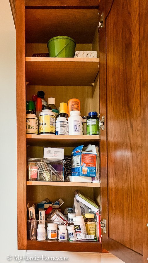 How to organize your kitchen cabinets using clear and simple strategies to tackle kitchen cabinet dysfunction without losing your mind. Medicine Cabinet Before