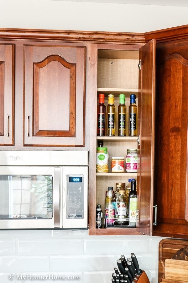 How to organize your kitchen cabinets using clear and simple strategies to tackle kitchen cabinet dysfunction without losing your mind. The oil and miscellaneous cabinet after... oh ya!