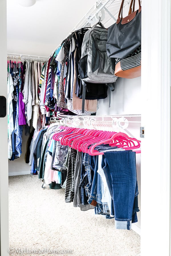 When organizing your master closet, keep items sorted for easy access.