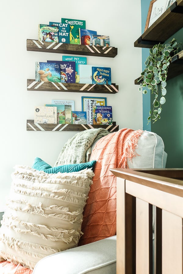 Nursery Bookshelves with books and chair