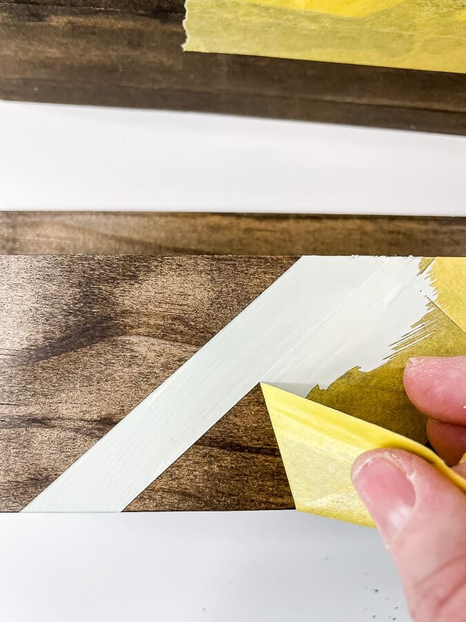 Nursery Bookshelves peeling the FrogTape off