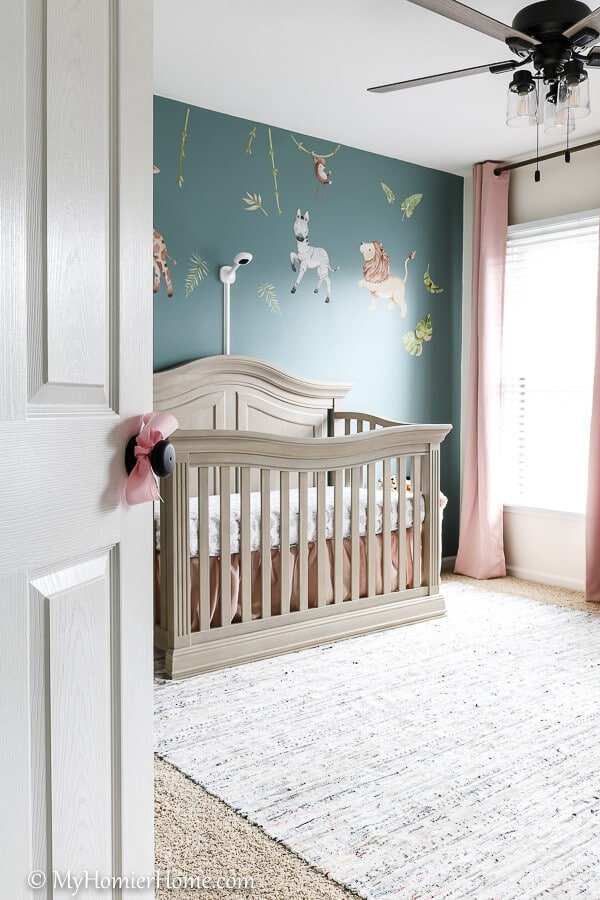 Looking for nursery inspiration? Check out our serene, safari-themed baby girl nursery reveal! The colors are relaxing & inviting!