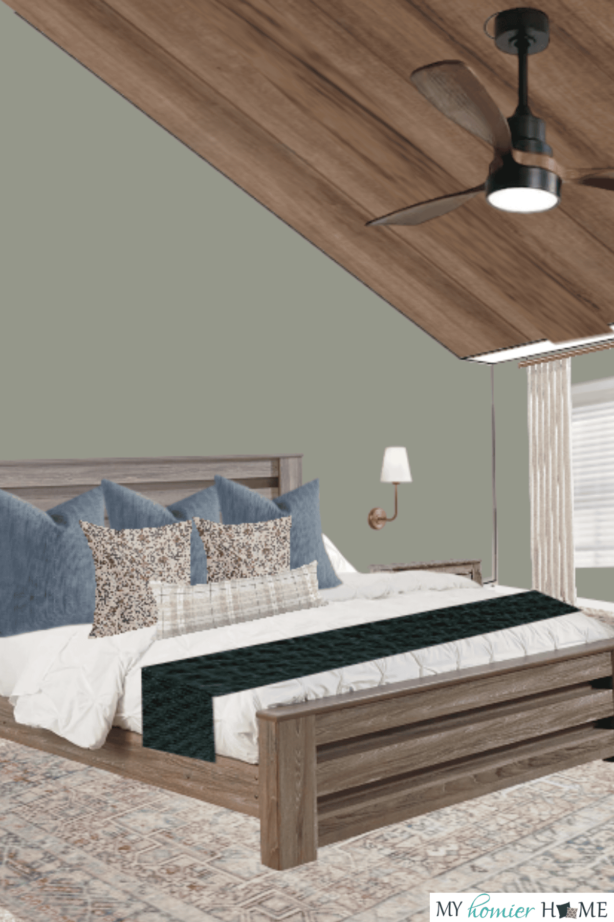 Discover primary bedroom ideas in a tranquil space featuring a wooden bed adorned with blue and patterned pillows, a dark green throw, and beige walls. Light curtains frame two windows, while a ceiling fan and wall-mounted lamp complete the look atop a geometric-patterned rug.